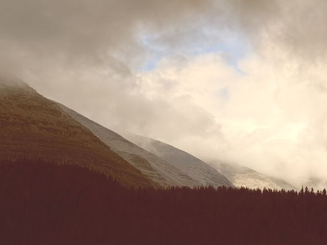 Mist lifting over Northern Rockies peaks