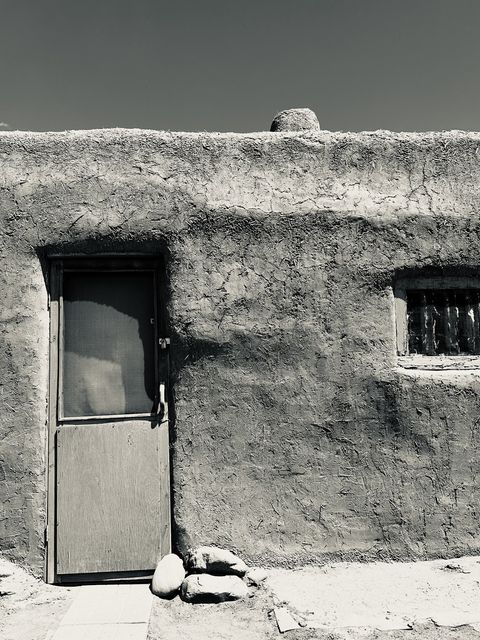 Sunlit Adobe Door Taos Pueblo