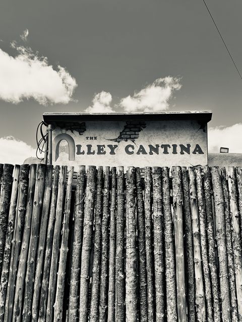 Taos Alley Cantina Peeking Over Fence