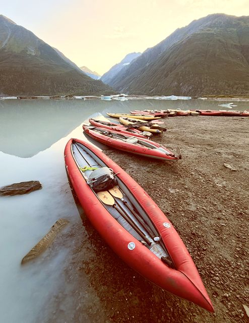 Red Kayaks on Glacial Shore