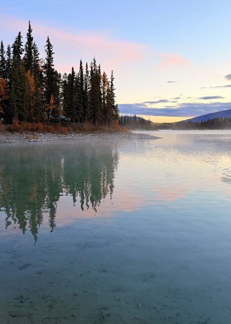 Misty Dawn Reflections at Boya Lake
